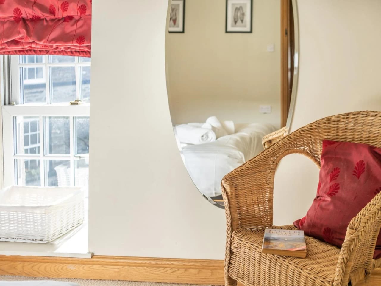 A close up shot of the chair, mirror and window